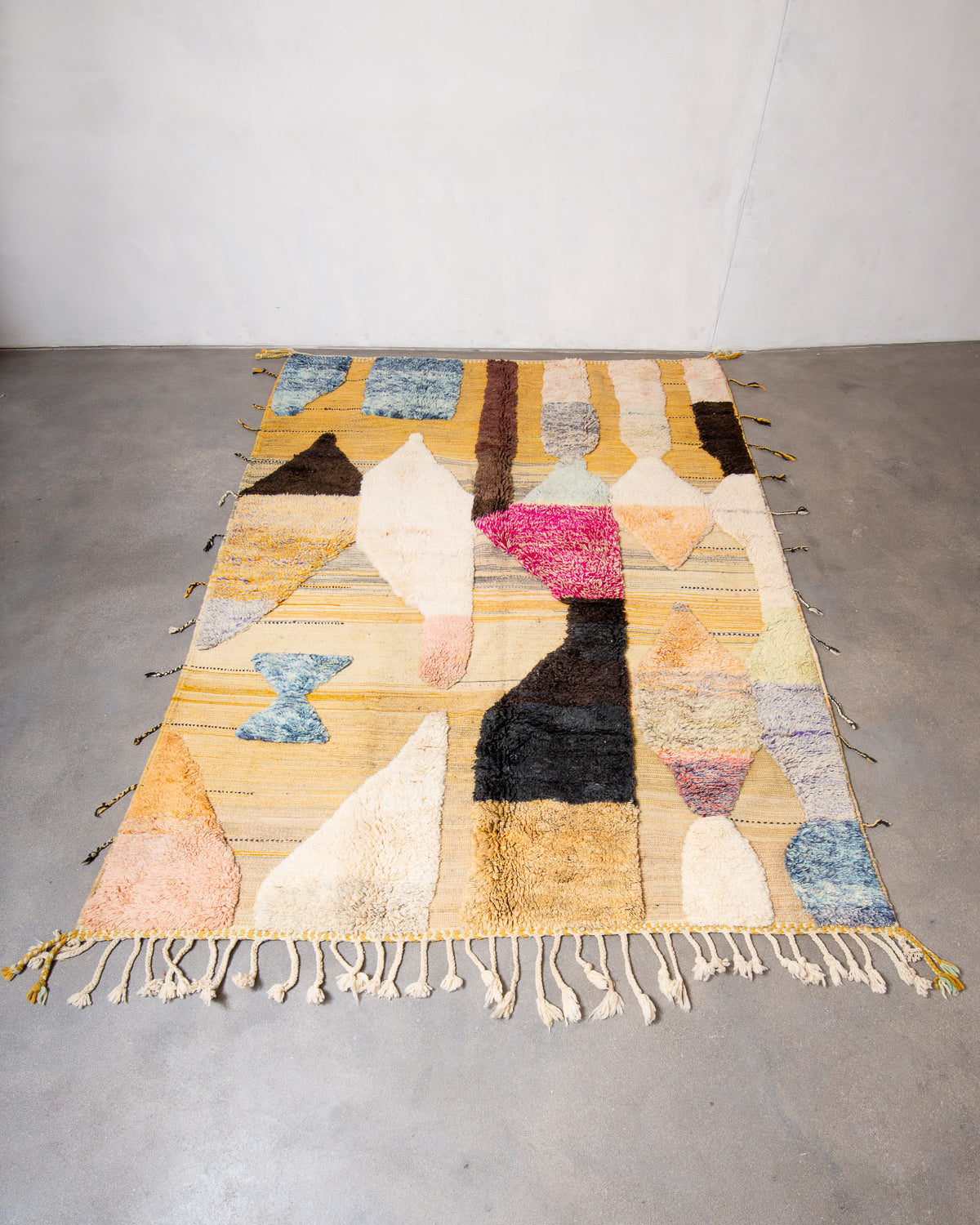 Modern, designer, handcrafted Berber rug from Morocco. Beniourain carpet with beautiful colours and patterns and fluffy wool texture.